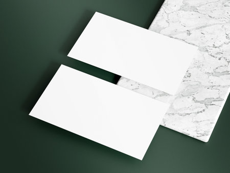 Business card mockup with dark green backgroundの写真素材