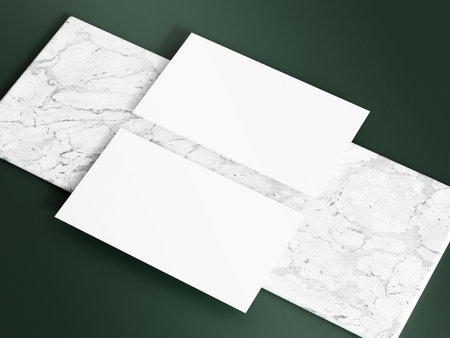 Business card mockup with dark green backgroundの写真素材