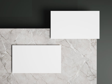 Business card mock up on white marble background.の写真素材