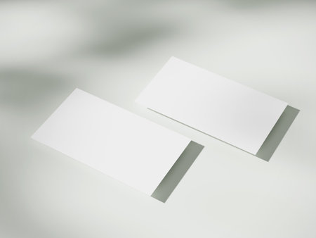 Business card mockup on aesthetic warm white backgroundの写真素材