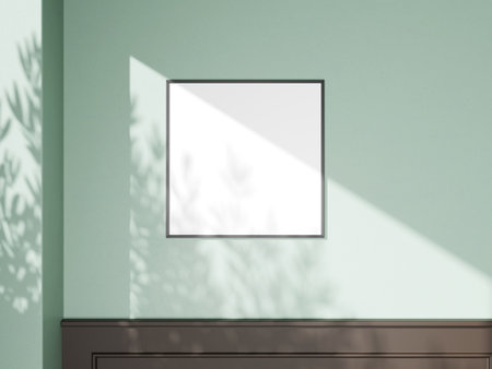 Bright and clean poster frame with natural sunlight casting delicate shadows.の写真素材