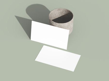 Clean business card mockup with light and shadow contrast.の写真素材