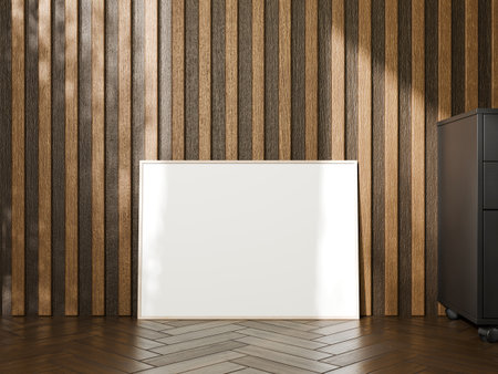 Framed poster mockup placed on the wooden floor with a modern background.の写真素材