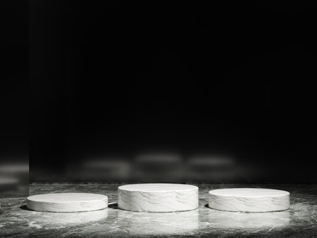 Marble podiums set in an artistic formation with minimalistic lighting and black background.の写真素材