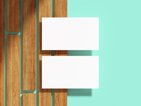 Elegant business card resting on wooden boards, minimalistic design.の写真素材