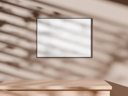 Frame mockup on wall with warm lighting and shadow play.の写真素材
