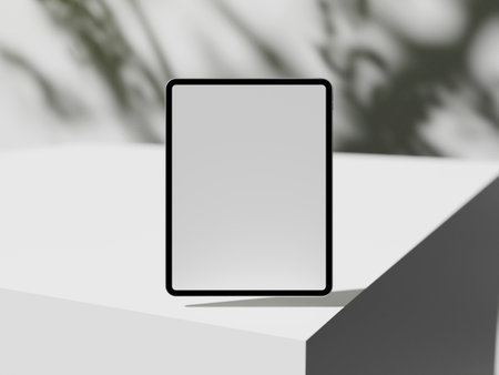 Tablet screen mockup with shadow on bright white abstract backgroundの写真素材