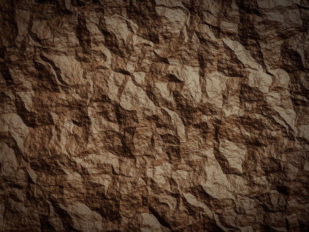 Rough, uneven rock surface in brown tones with bold wrinkles and creases.の写真素材