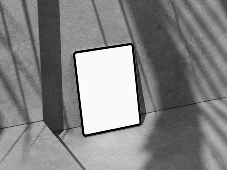 Angled tablet mockup against corner wall, soft light stripes for web or app.の写真素材