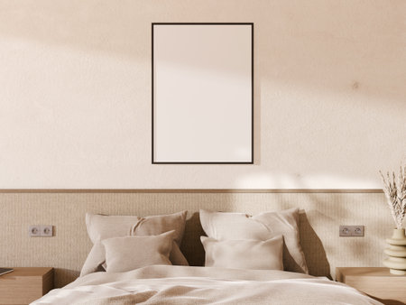 Modern minimalist bedroom with a blank frame mockup hanging on the wall.の写真素材