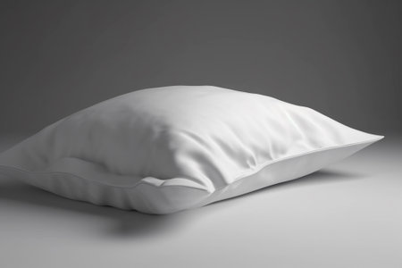 White pillow on a gray background. 3d rendering. Computer digital drawing.の素材