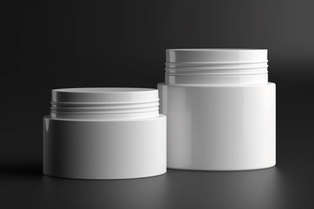 Blank white cosmetic jar mockup on black background. 3d renderingの素材