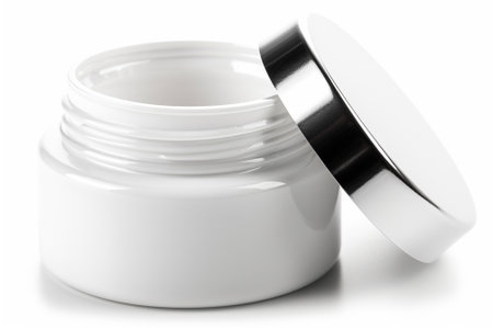 cosmetic cream in a white jar isolated on a white background.の素材