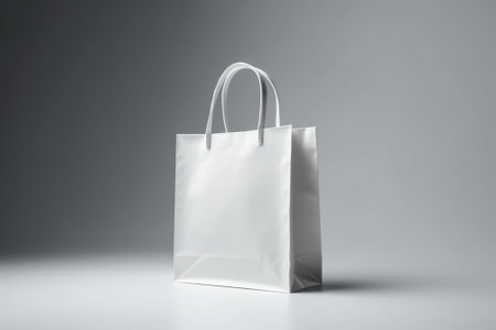 White paper bag on grey background. Mock up. 3D Renderingの素材