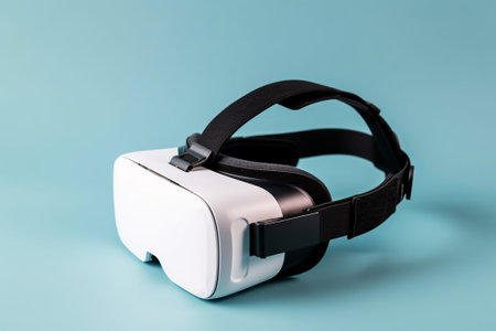 Virtual reality glasses on blue background. VR headset. Studio shot.の素材