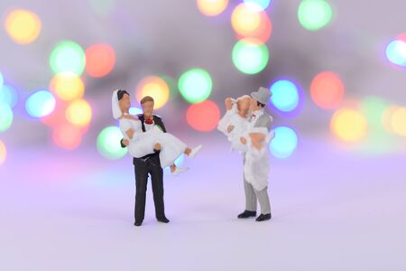 Groom is carrying a brideの写真素材