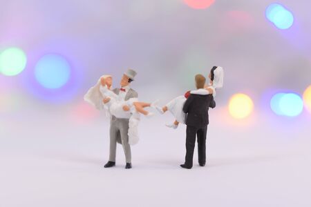 Groom is carrying a brideの写真素材