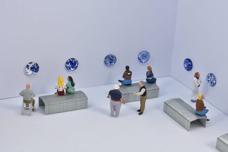 miniature people visit a museumの写真素材
