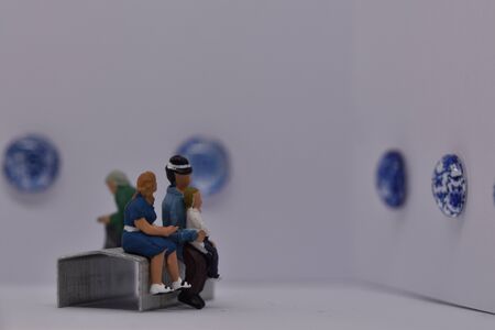 miniature people in an art gallery museumの写真素材