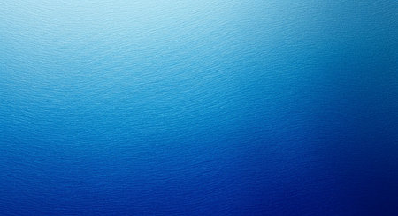 Blue sea water surface texture background. Top view. Copy space.の素材