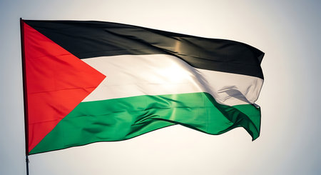 Palestine flag waving in the wind on blue sky background. 3d renderingの素材