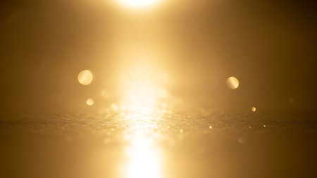 golden glitter vintage lights background. gold and black. de focusedの素材