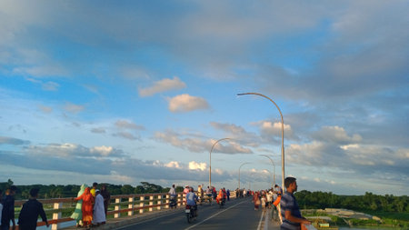 Unidentified people on the road in Kanchanaburi, Thailand.の写真素材