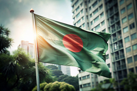 Bangladesh flag waving in the wind with cityscape background.の素材