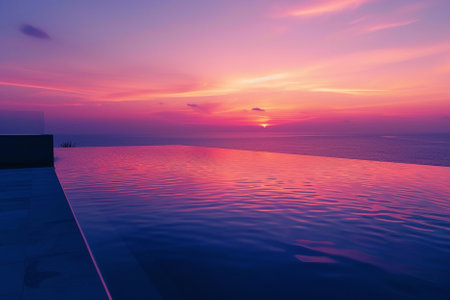 Beautiful luxury swimming pool in hotel pool resort at sunset times - Vintage Filterの素材