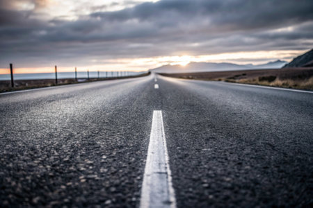 Empty asphalt road in Iceland at sunset. Long exposure. Toned.の素材
