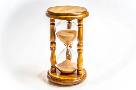 Sand hourglass isolated on white backgroundの写真素材