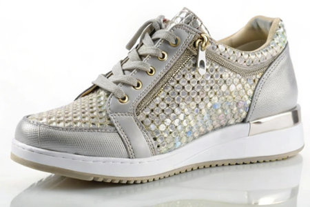 Stylish elegant trendy designer fashionable women's sneakers isolated on white backgroundの写真素材