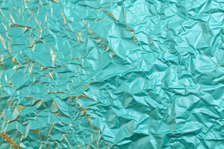 Gold foil shiny paper texture background for wall paper decoration elementの写真素材