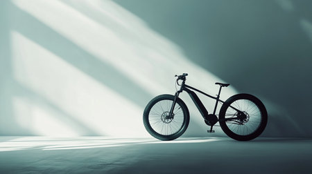 Silhouette of a mountain bike on the floor in the roomの写真素材