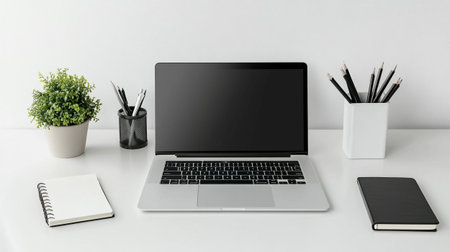 Close up of modern workplace with blank laptop, stationery and copy space on white wall background....