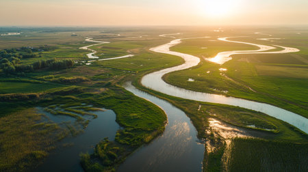 Aerial view of the river at sunset. Beautiful summer landscape.