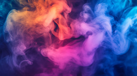 Dense multicolored smoke of  pink, blue and purple colors on a black isolated background. Background...