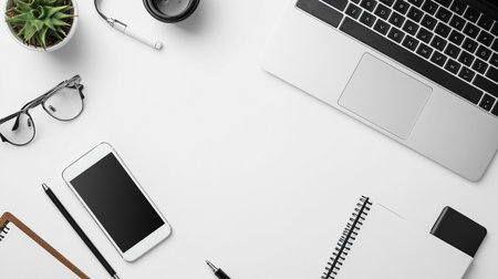White office desk table with laptop, smartphone, notebook, pen, glasses and coffee cup. Top view...