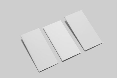 Blank white trifold brochure isolated on gray background. 3d rendering series 9の写真素材