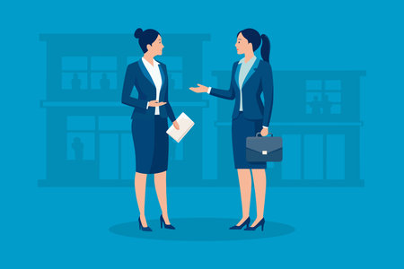 Two businesswomen in suits discussing while holding a briefcase in a professional setting, flat vector illustrationのイラスト素材