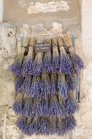 Lavender bouquet on house wallの写真素材