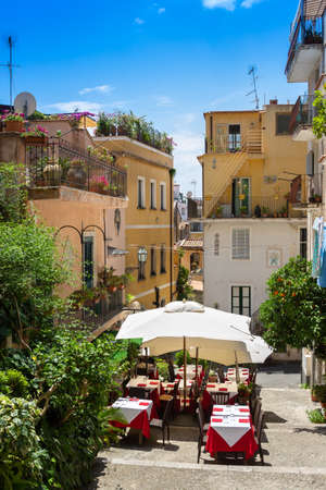 Street restaurant in the historic old town of Taorminaの写真素材