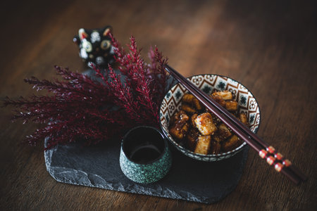 Glazed tofu served in a Japanese bowlの写真素材