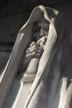 mortal statue from a graveyard closeupの写真素材