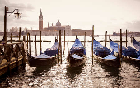 venetian gondolas with the san giorgio maggioreの写真素材