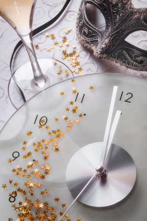 new year still life with clock and maskの写真素材