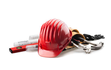 isolated hard hat with tools and blueprint on whiteの写真素材