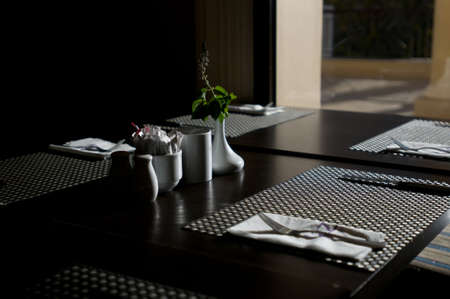 serving in the restaurant on table with backlightの写真素材