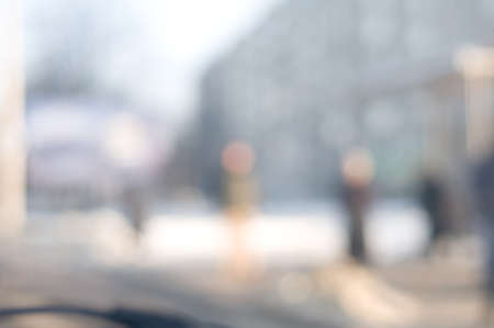 Traffic abstract background with blurry buildings, street signs and carsの写真素材