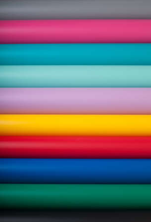 Colorful plastic film background in a rowの写真素材